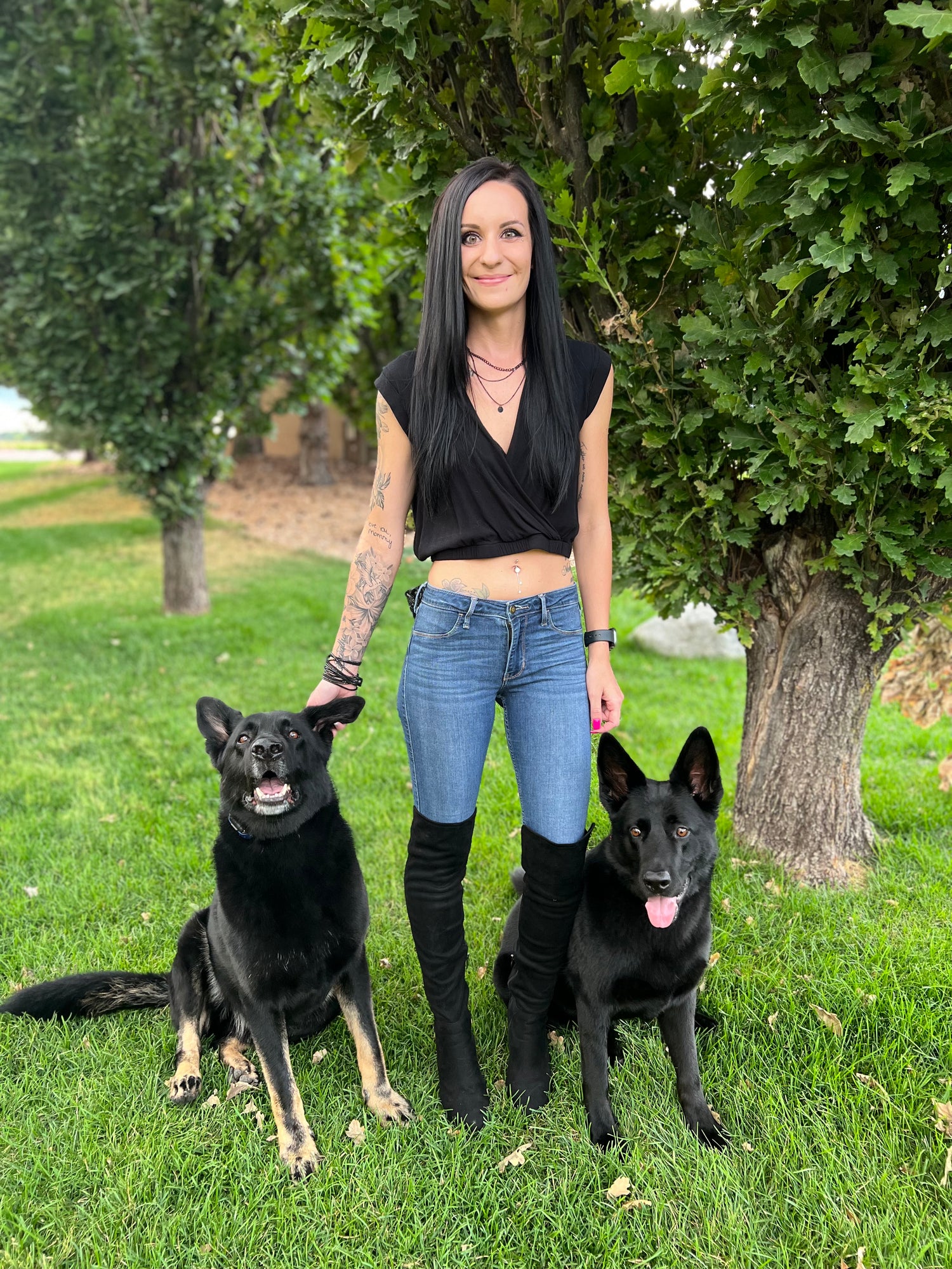 the owner of KM Customs and her dogs